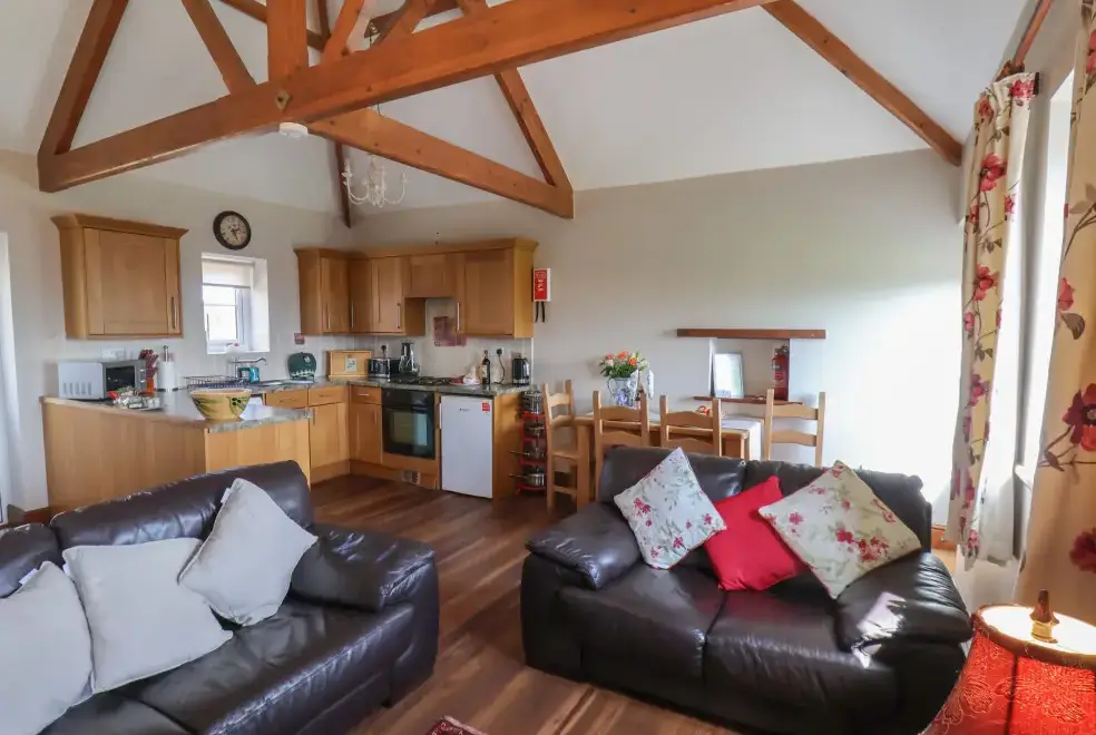 Open plan living area at Broadings Cottage at Broadings Farm