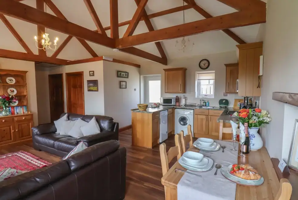 Open plan living area at Broadings Cottage at Broadings Farm