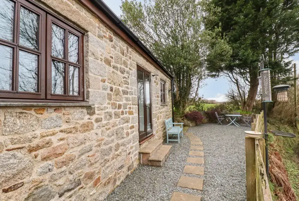 Patio area at Brock's Self-Catering Cornish Barn Conversion, The South West