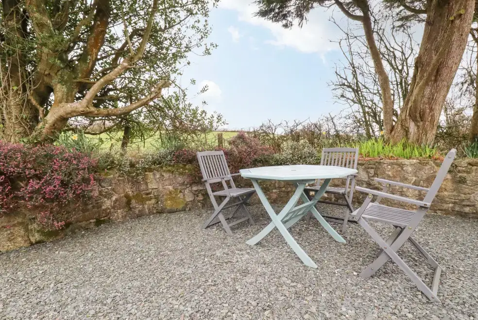 Patio area at Brock's Self-Catering Cornish Barn Conversion, The South West