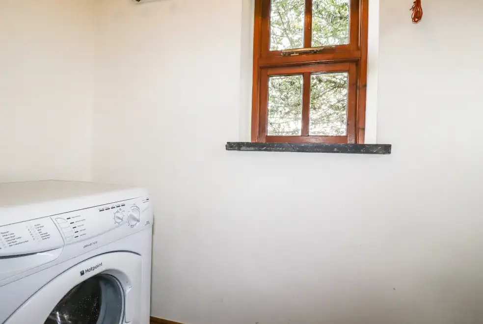 Utility room at Brock's Self-Catering Cornish Barn Conversion, The South West