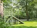 Outdoor games area at Bryn Derwen - thumbnail photo