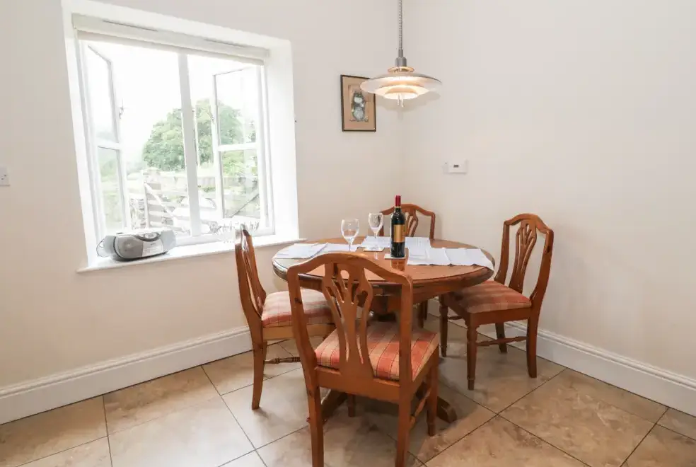 Dining room at Bryn Howell Holiday Barn