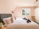 Bedroom at Bucknowle Lodge - thumbnail photo