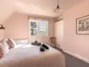 Bedroom at Bucknowle Lodge - thumbnail photo