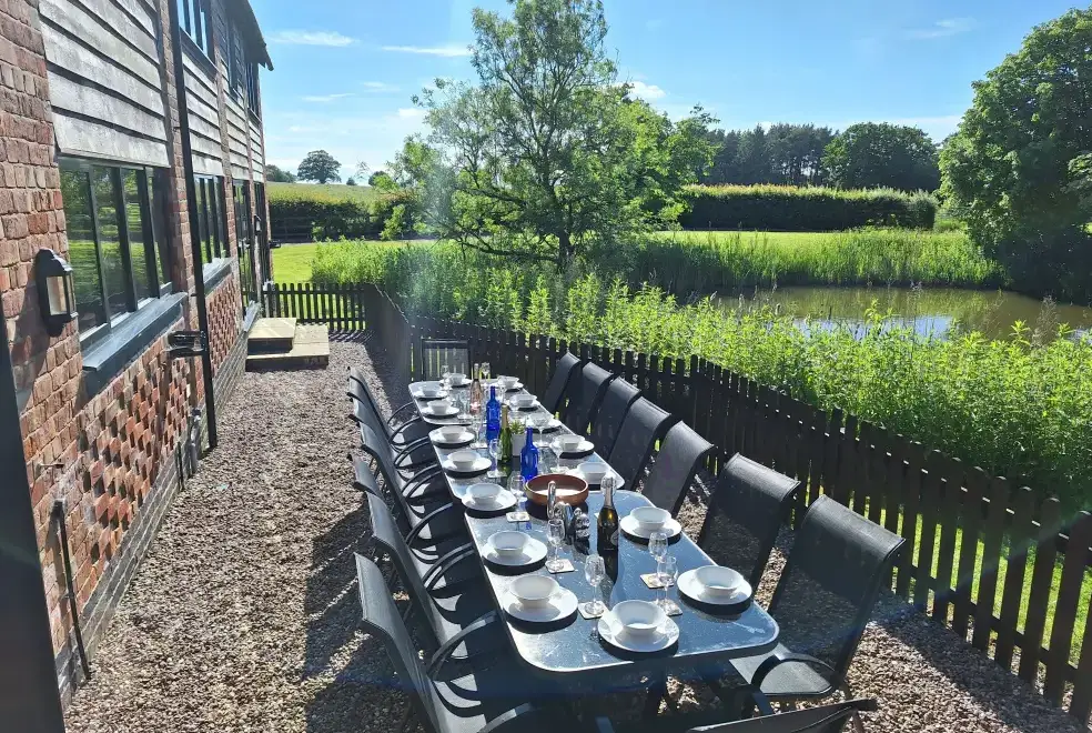 Garden furniture at Buttercups 5 Star Cottage with Indoor Pool, Sports Court & Toddler Play Area