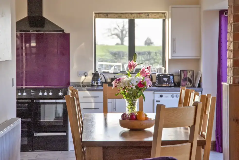Kitchen/diner at Buttercups Haybarn 5 Star Cottage with Indoor Pool, Sports Court & Toddler Play Area