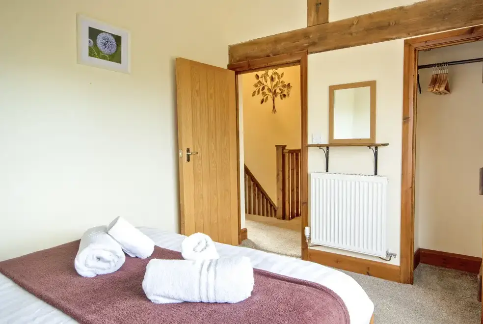 Bedroom at Buttercups Haybarn 5 Star Cottage with Indoor Pool, Sports Court & Toddler Play Area