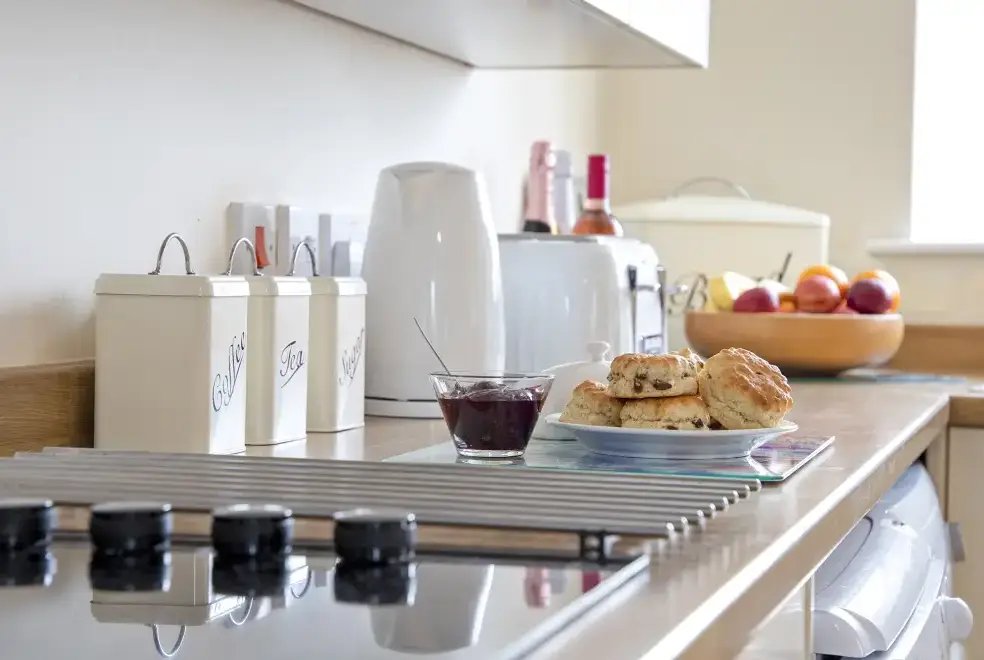 Well equipped kitchen at Buttercups & Hayloft Sleeps & Dines 16 with Pool, Sports Court & Play Area