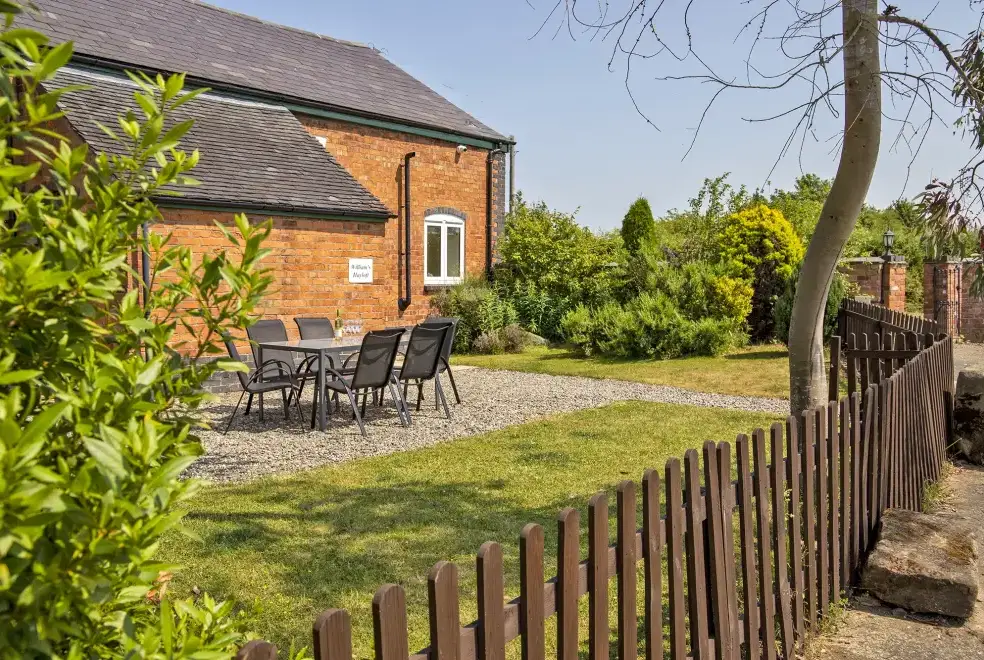 Garden furniture at Buttercups & Hayloft Sleeps & Dines 16 with Pool, Sports Court & Play Area