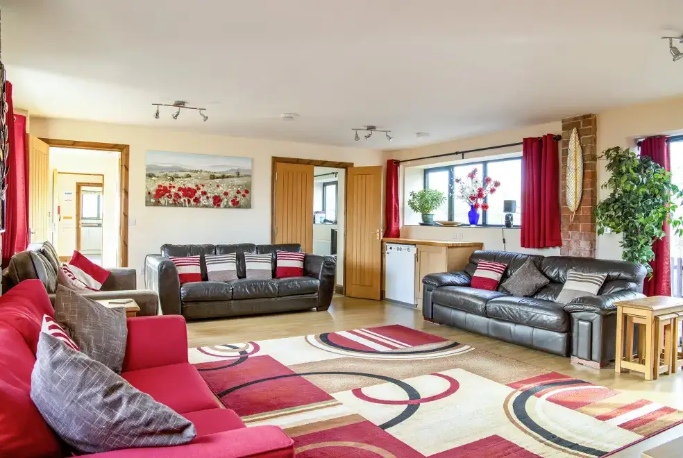 Lounge at Buttercups & Hayloft Sleeps & Dines 16 with Pool, Sports Court & Play Area