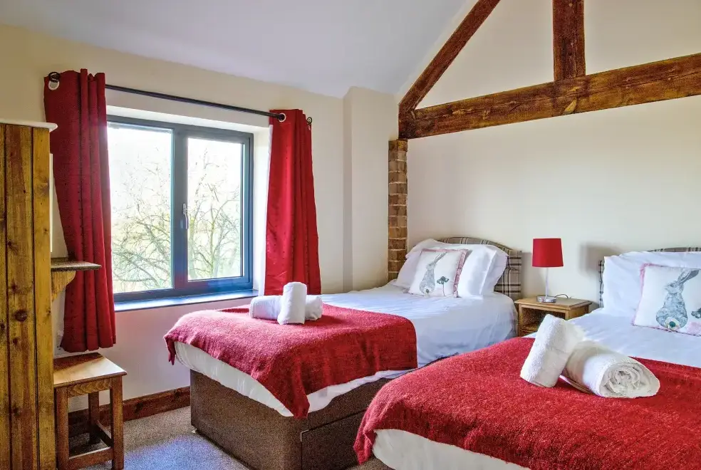 Bedroom at Buttercups & Hayloft Sleeps & Dines 16 with Pool, Sports Court & Play Area