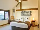 Bedroom at Buttercups & Hayloft Sleeps & Dines 16 with Pool, Sports Court & Play Area - thumbnail photo