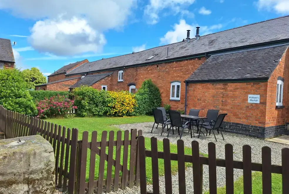 Garden furniture at Buttercups & Hayloft Sleeps & Dines 16 with Pool, Sports Court & Play Area