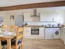 Kitchen/diner at Buttercups & Hayloft Sleeps & Dines 16 with Pool, Sports Court & Play Area - thumbnail photo