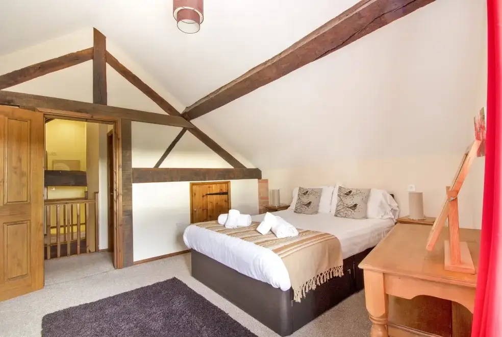 Bedroom at Buttercups & Hayloft Sleeps & Dines 16 with Pool, Sports Court & Play Area