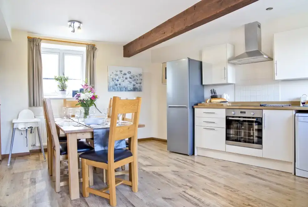Kitchen/diner at Buttercups & Hayloft Sleeps & Dines 16 with Pool, Sports Court & Play Area
