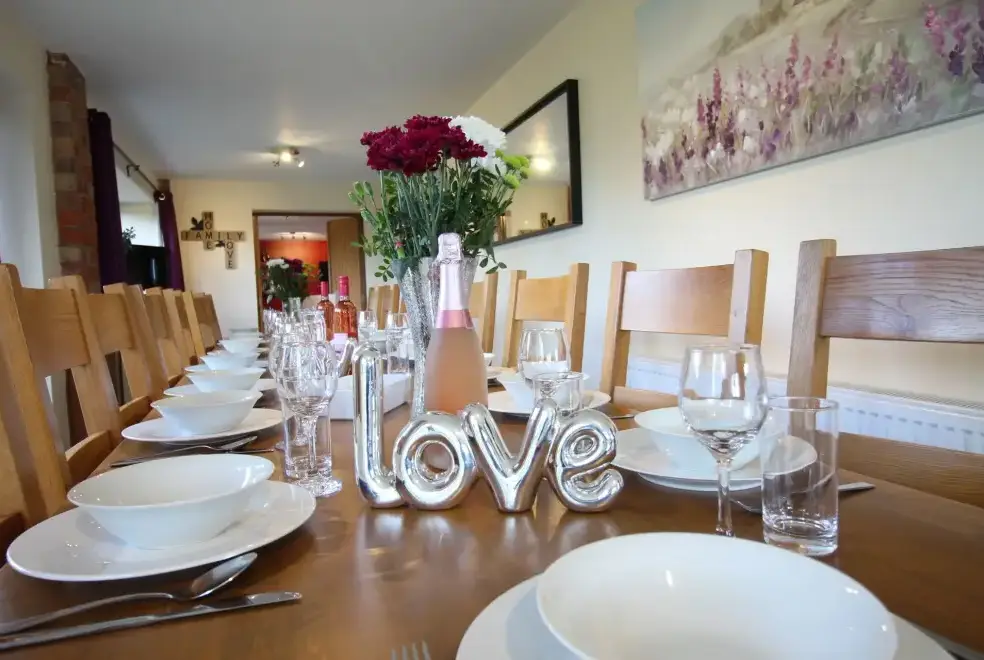 Dining room at Buttercups & Hayloft Sleeps & Dines 16 with Pool, Sports Court & Play Area