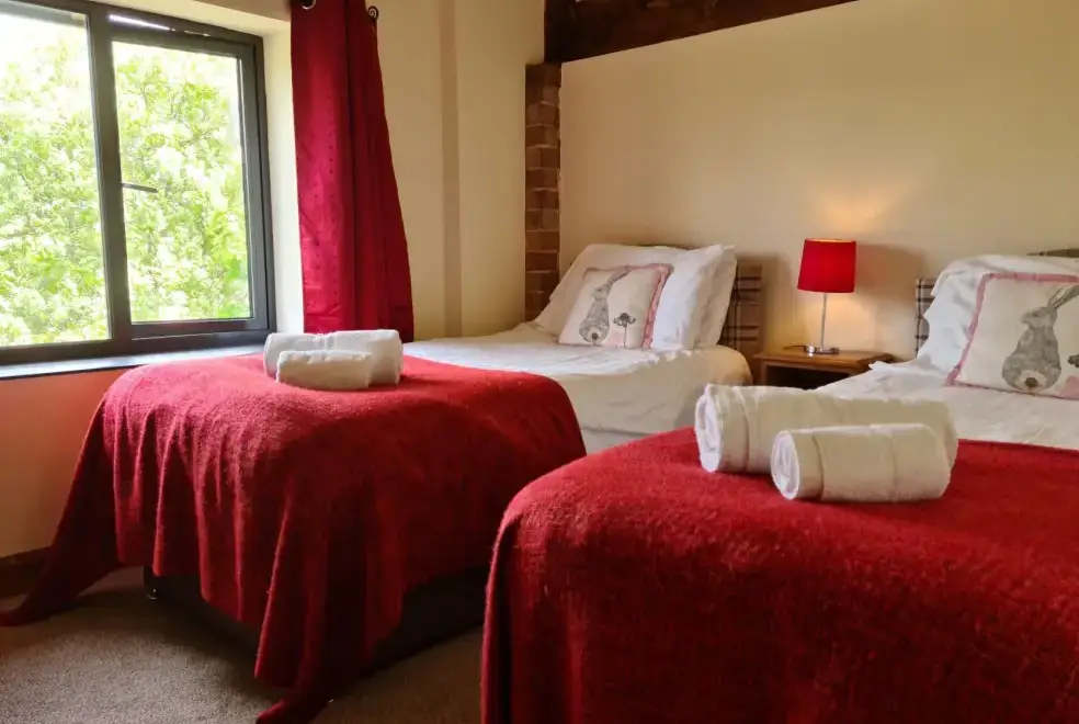 Bedroom at Buttercups & Hayloft Sleeps & Dines 16 with Pool, Sports Court & Play Area