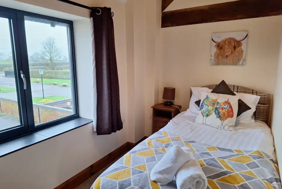 Bedroom at Buttercups & Hayloft Sleeps & Dines 16 with Pool, Sports Court & Play Area