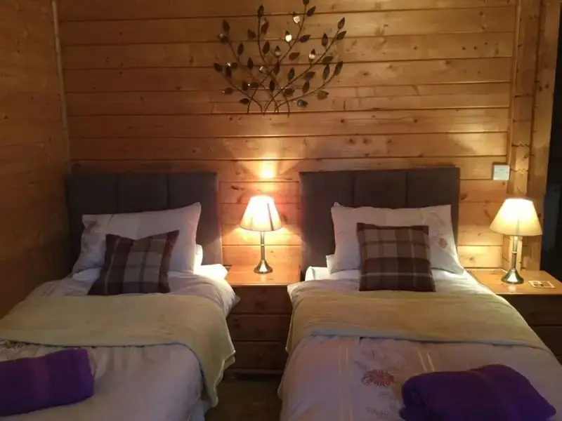 Bedroom at Caban Iwrch with all weather Hot tub