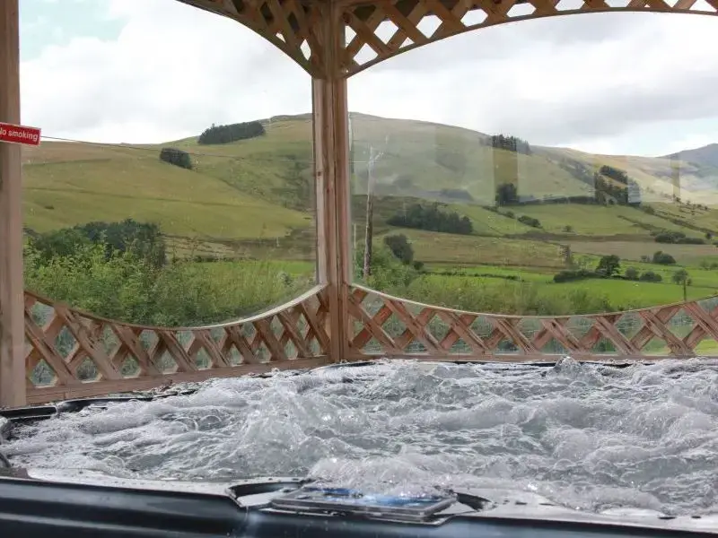 Private Hot Tub at Caban Iwrch with all weather Hot tub