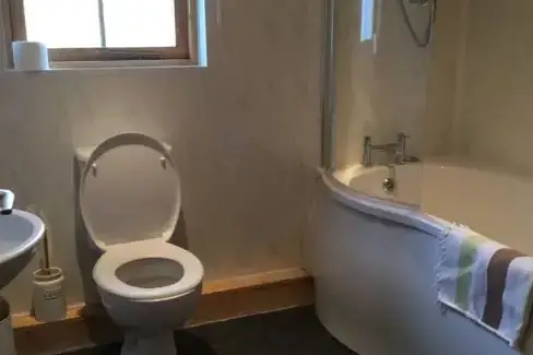 Family bathroom at Caban Iwrch with all weather Hot tub, Powys