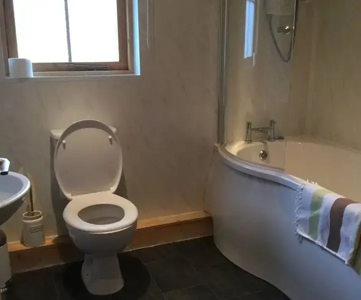 Family bathroom at Caban Iwrch with all weather Hot tub