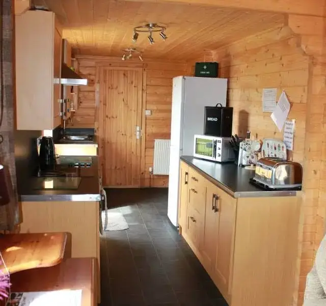 Kitchen/diner at Caban Iwrch with all weather Hot tub