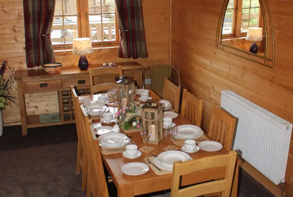 Dining room at Caban Iwrch with all weather Hot tub