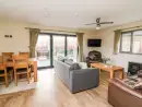 Open plan living area at Caban Nant Ddu - thumbnail photo