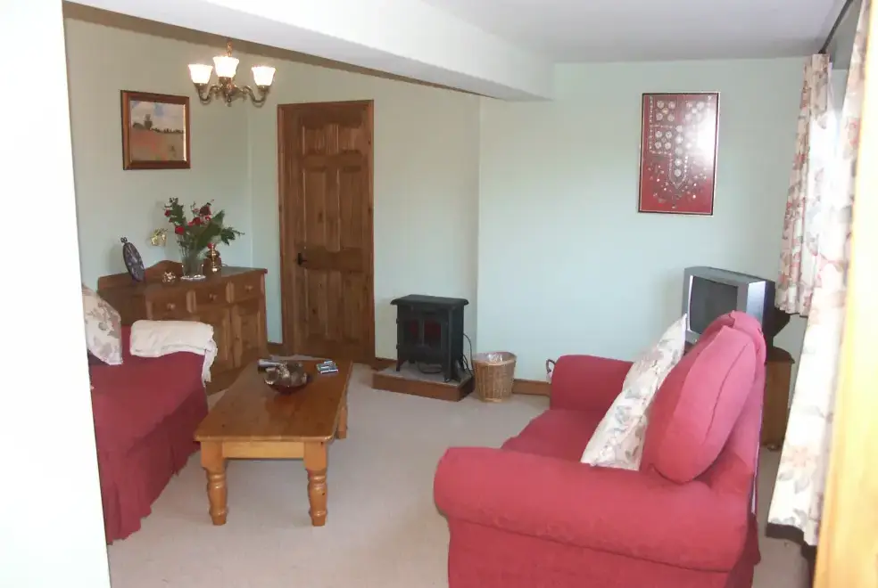 Lounge at Cider Barrel Cottage