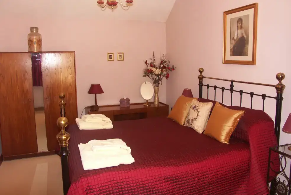 Bedroom at Cider Barrel Cottage