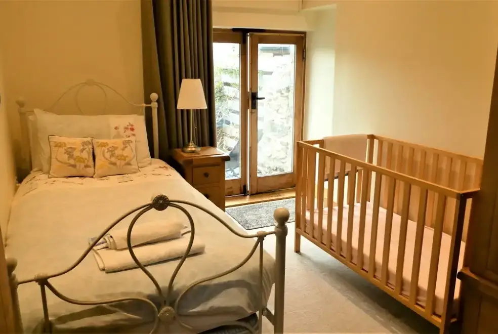Bedroom at Cider House at Nutcombe Cottages