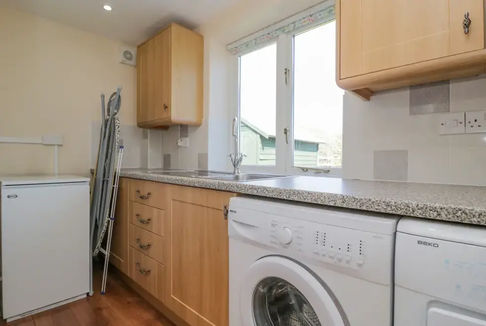 Utility room at Clock Tower Cottage