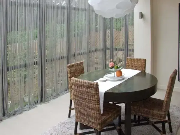 Dining room at Clouds Hill Holiday Home with Gym and Pool