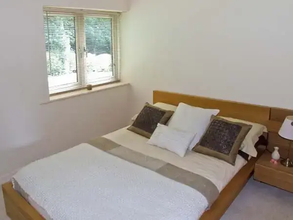 Bedroom at Clouds Hill Holiday Home with Gym and Pool