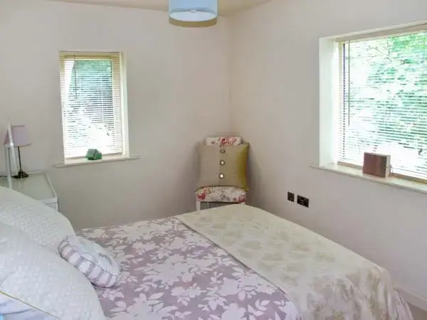 Bedroom at Clouds Hill Holiday Home with Gym and Pool