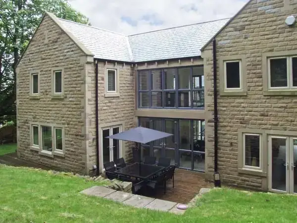 Decked area at Clouds Hill Holiday Home with Gym and Pool