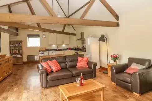 Open plan living area at Corner Pet-Friendly Barn, Dorset AONB, Dorset