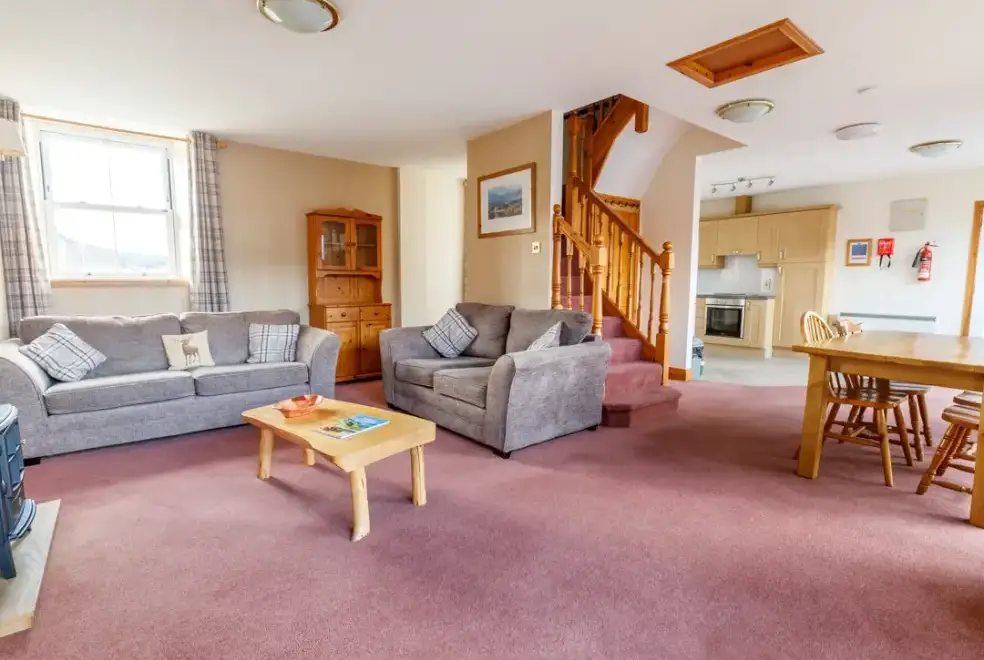 Open plan living area at Courtyard Cottage
