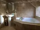 Luxurious family bathroom at Craig Cottage - thumbnail photo