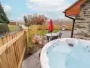 Private Hot Tub at Cut Moch, Plas Moelfre Hall Barns - thumbnail photo