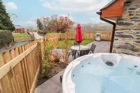 Private Hot Tub at Cut Moch, Plas Moelfre Hall Barns, Denbighshire