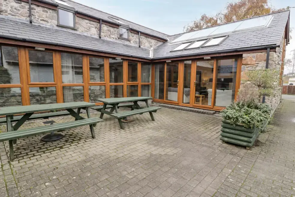 Patio area at Ddol Helyg Barn