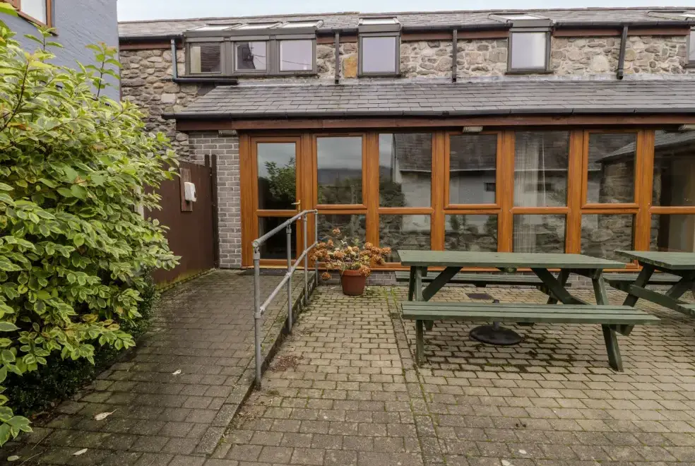 Patio area at Ddol Helyg Barn