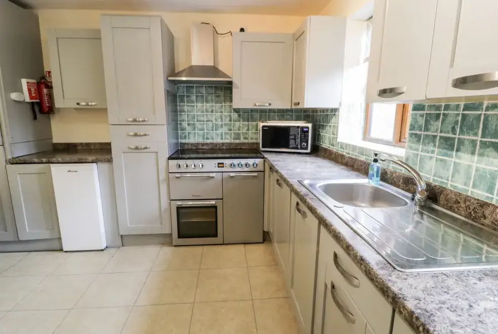 Kitchen/diner at Ddol Helyg Farmhouse