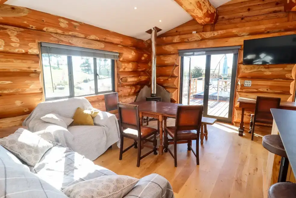 Open plan living area at Douglas Cabin