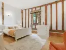 King-size bedroom at Doves Barn - thumbnail photo