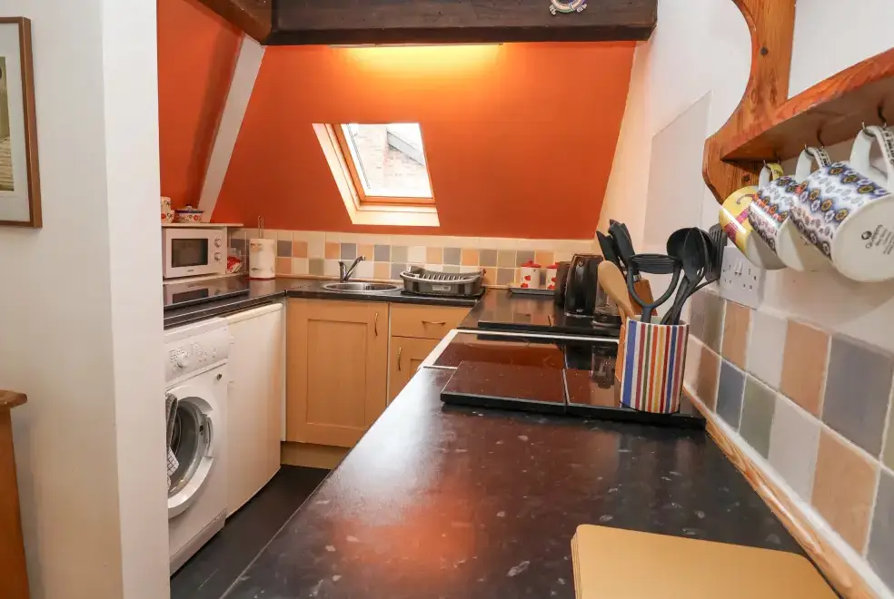 Well equipped kitchen at Dragon's Den